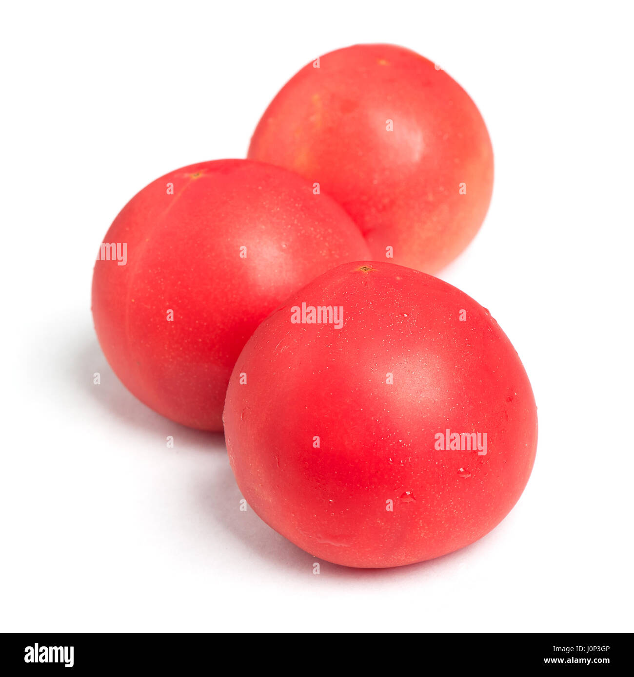 Tomatoes isolated on white background Stock Photo - Alamy