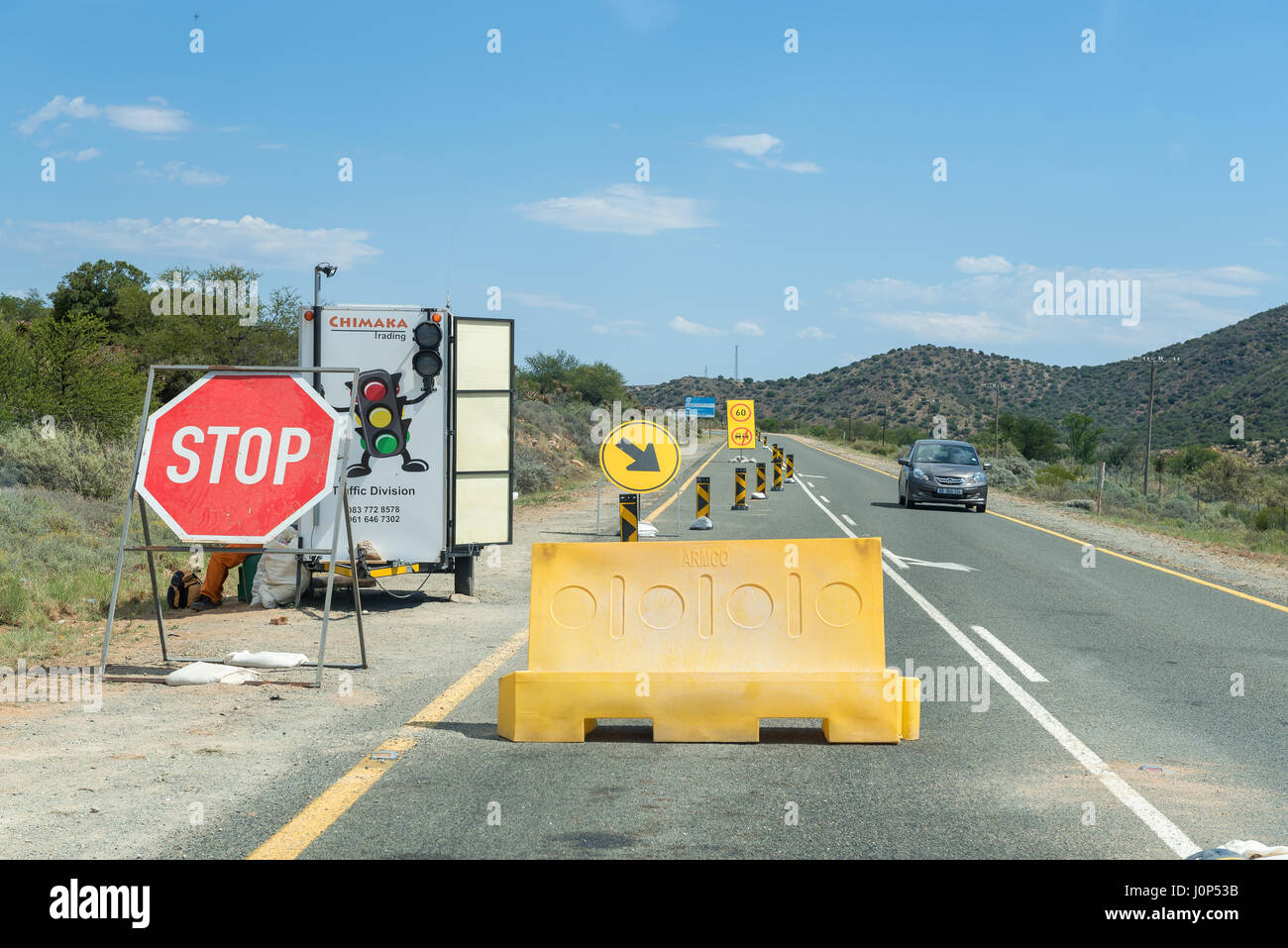 WILLOWMORE, SOUTH AFRICA - MARCH 23, 2017: A traffic control point at roadworks on the N9 road near Willowmore in the Eastern Cape Province Stock Photo