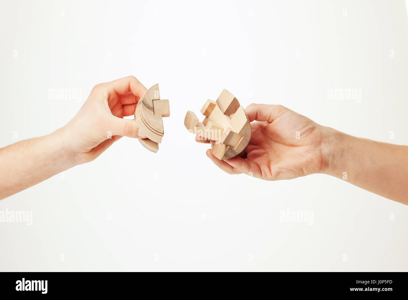 puzzle in hand isolated on white background Stock Photo - Alamy