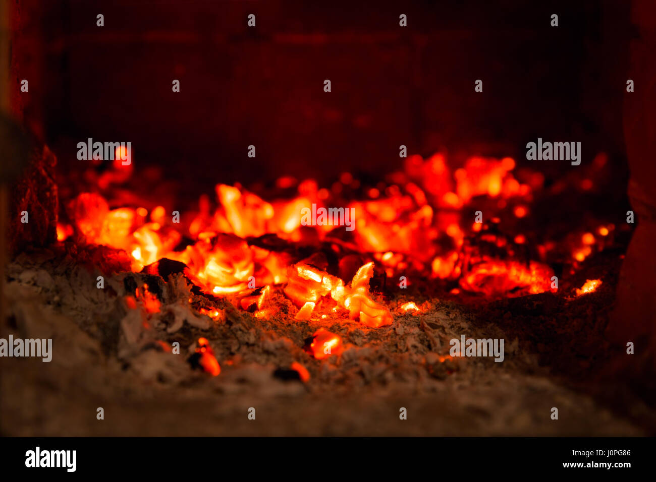 Fire flame coals in fireplace with ashes Stock Photo Alamy