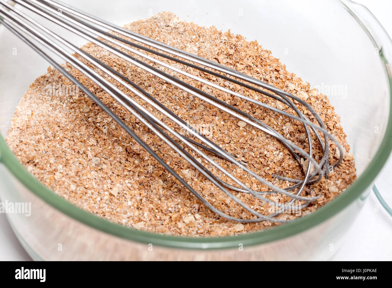 Wheat bran muffins preparation Mixing dry ingredients to prepare