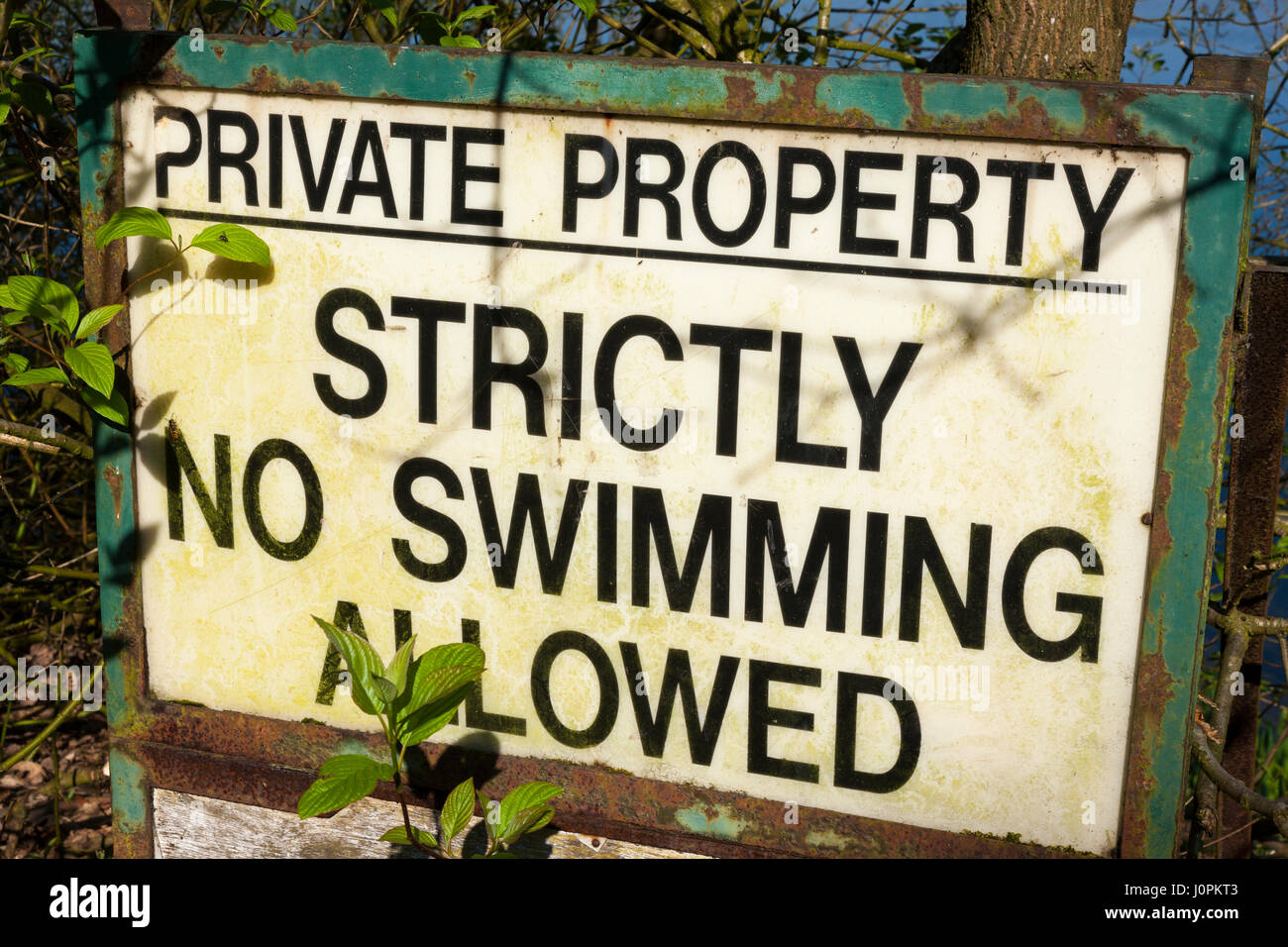 Strictly no swimming allowed sign at Astbury Mere Country Park, Astbury, Congleton, Cheshire, UK, Stock Photo