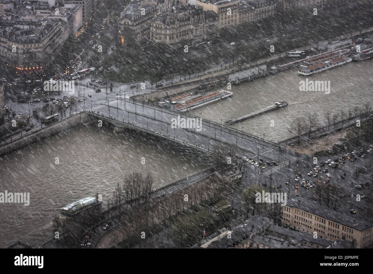 Sudden storm in spring in the French capital. View from Eiffel tower on place de l'Alma and pont de l'Alma, avenue Montaigne, cours Albert 1er, port d Stock Photo