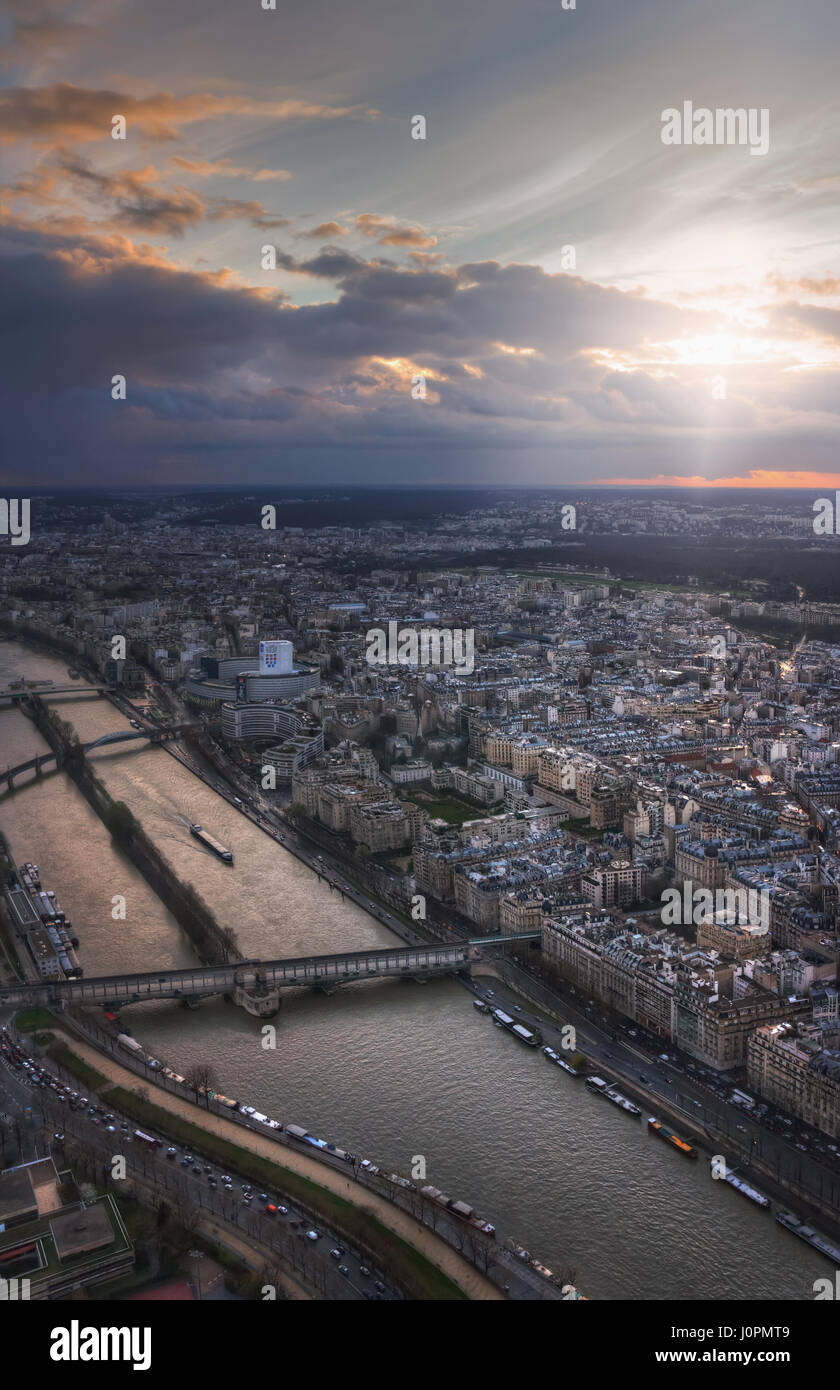 Paris and River Seine at sunset. View from Eiffel Tower on the Pont de Bir-Hakeim, Quai Branly, Port de Suffren, Allée des Cygnes, Pont Rouelle, Pont  Stock Photo