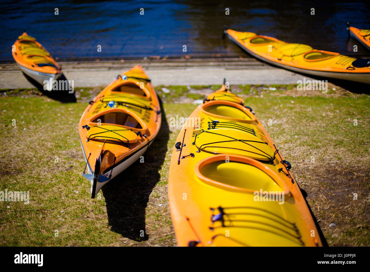 River kayaks sit ready to take customers, Yarra, Melbourne Stock Photo Alamy