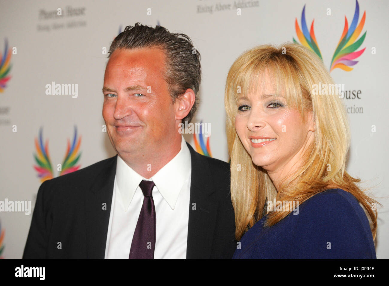 (L-R) Friends actors Matthew Perry and Lisa Kudrow attend the 12th Annual Triumph for Teens Awards Gala, June 15th, 2015 at the Montage Beverly Hills in Beverly Hills, California. Stock Photo