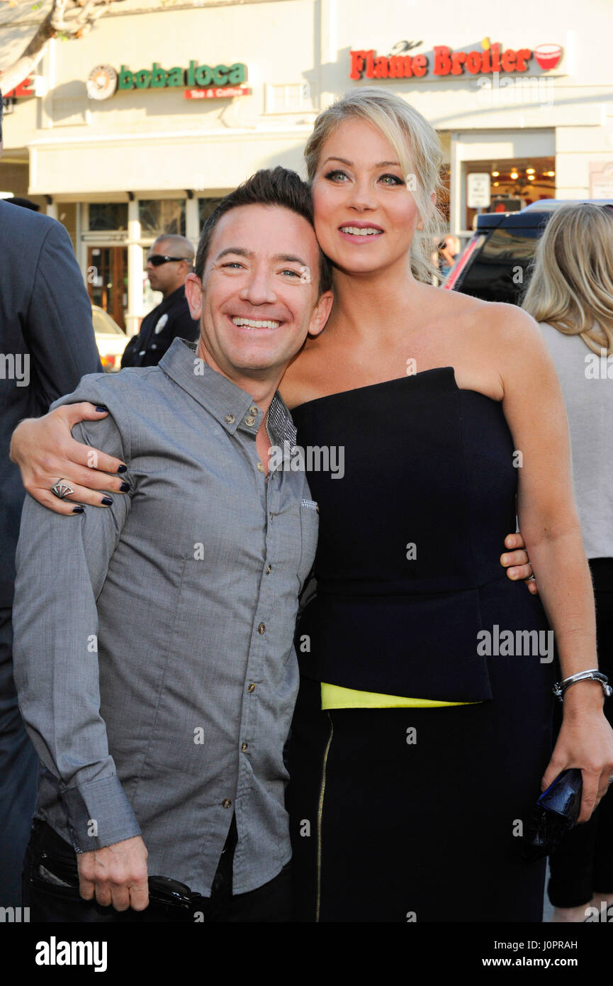 Actors David Faustino and Christina Applegate attend the VACATION premiere at the Westwood Village Theatre on July 27th, 2015 in Los Angeles, California. Stock Photo