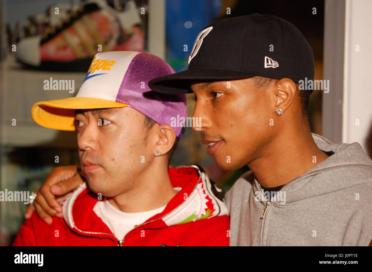 Pharrell Williams and designer Nigo at the launch of Pharrrell's new  footwear and apparel range at the Sanderson Hotel in London's West End. The  producer / artist of Neptunes and N.E.R.D, has