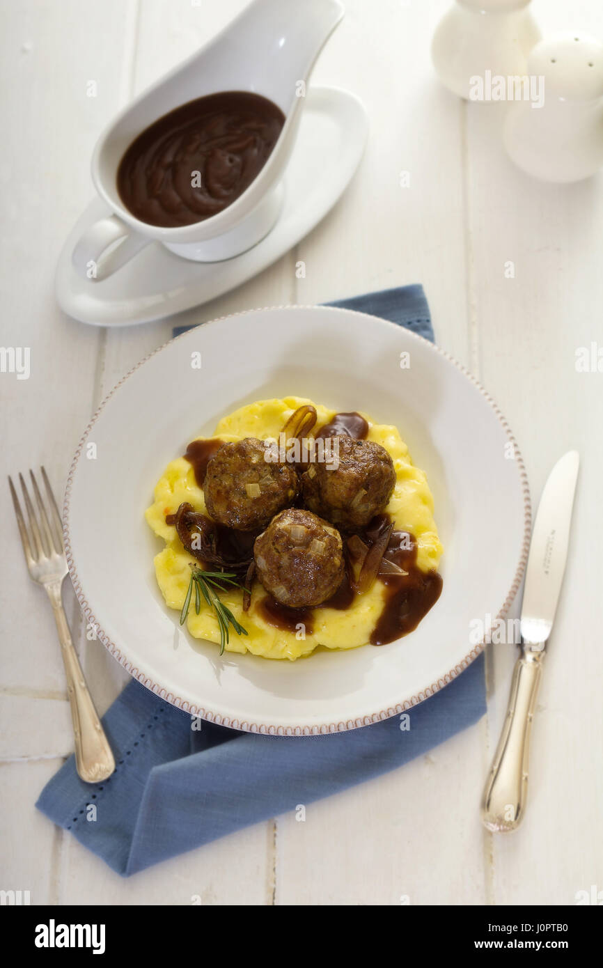 Meatballs with gravy on mashed potatoes Stock Photo