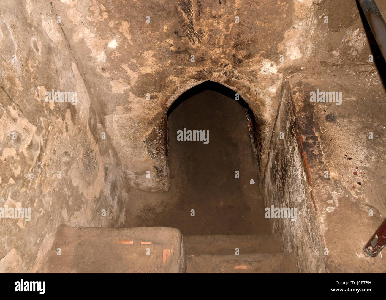 Steps lead down to Viet Cong tunnel at Cu Chi Stock Photo