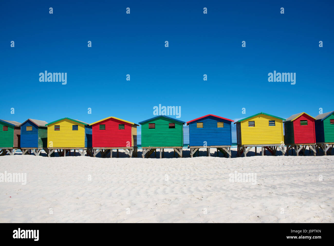 Colourful painted Victorian beach huts Muizenberg Beach Cape Peninsular Cape Town South Africa Stock Photo
