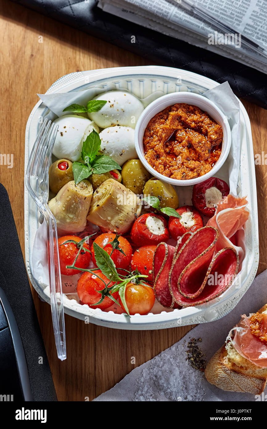 Antipasti lunch office mozarella, artichoke, salami, red pesto