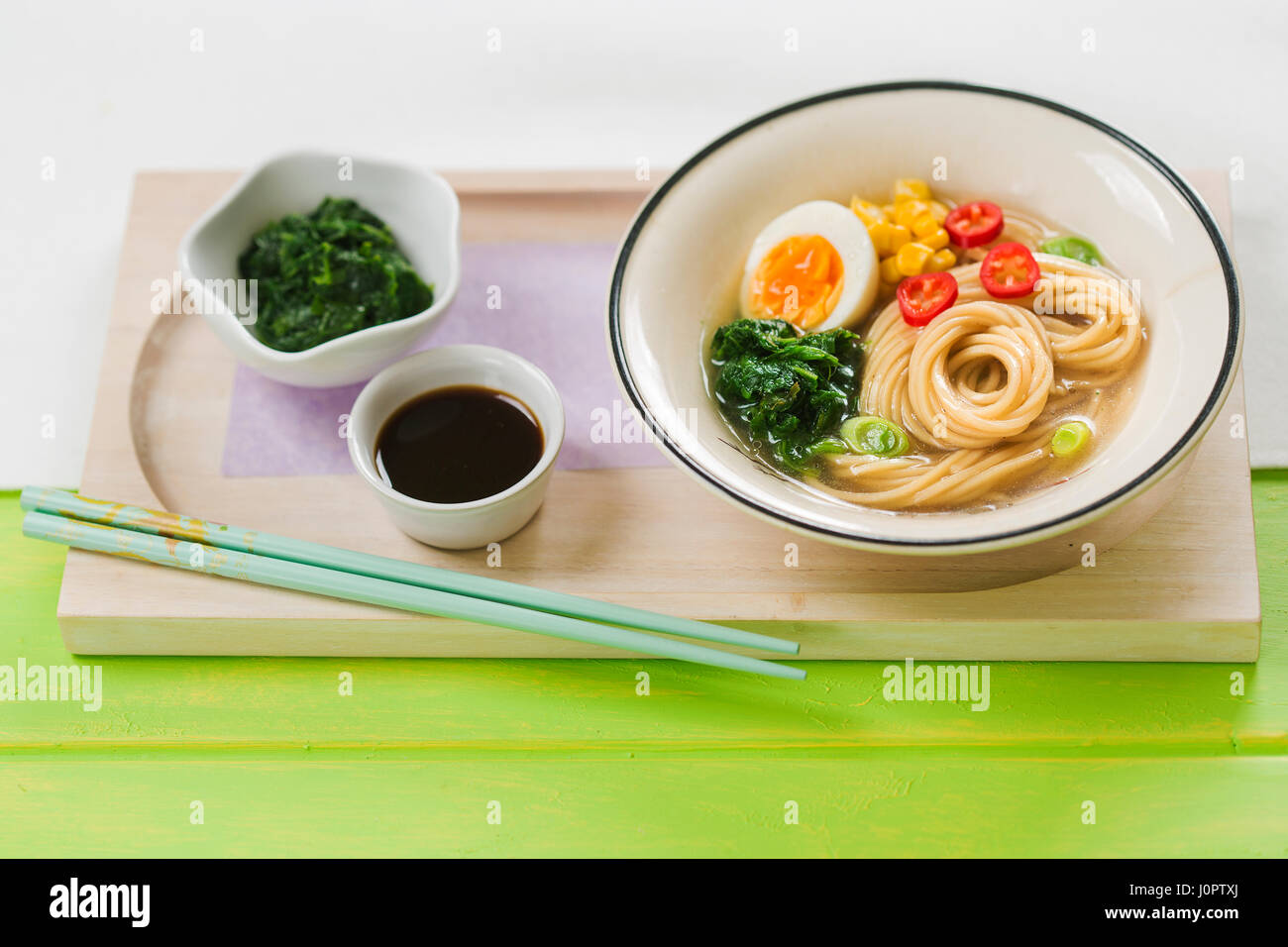 Ramen noodle soup with spinach and soy sauce Stock Photo Alamy