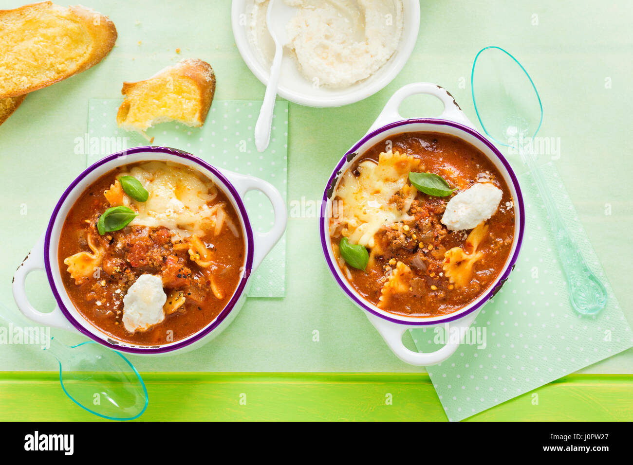 Lasagne pasta soup with ricotta and basil Stock Photo Alamy