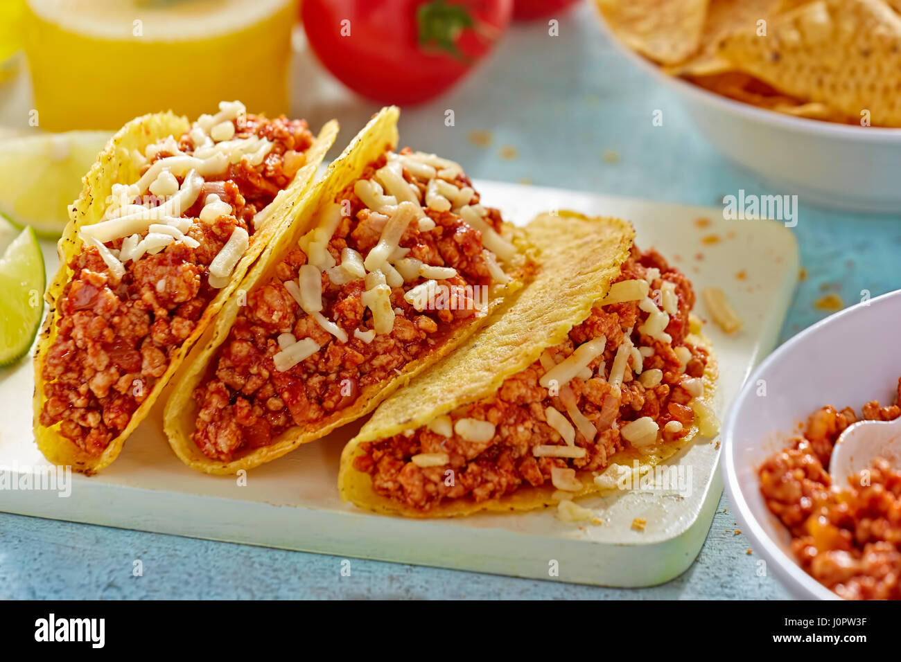 Turkey chilli tacos with cheddar cheese Stock Photo