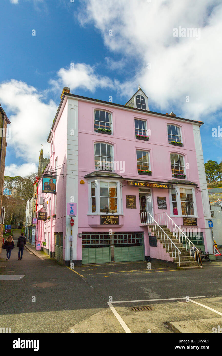 The brightly coloured King of Prussia pub sits in one of the narrow streets in the historic port of Fowey, Cornwall, England Stock Photo