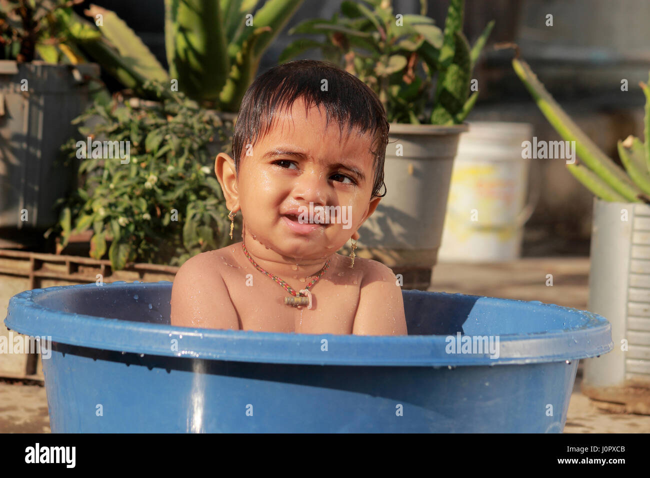 Boy splashing in bathtub hires stock photography and images Alamy