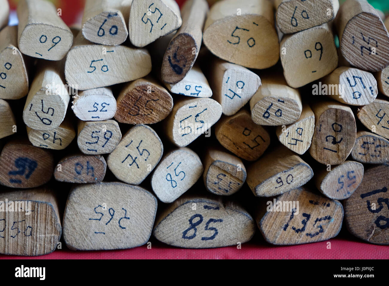 A heap sandalwood and counted and number written on each sandalwood Stock Photo