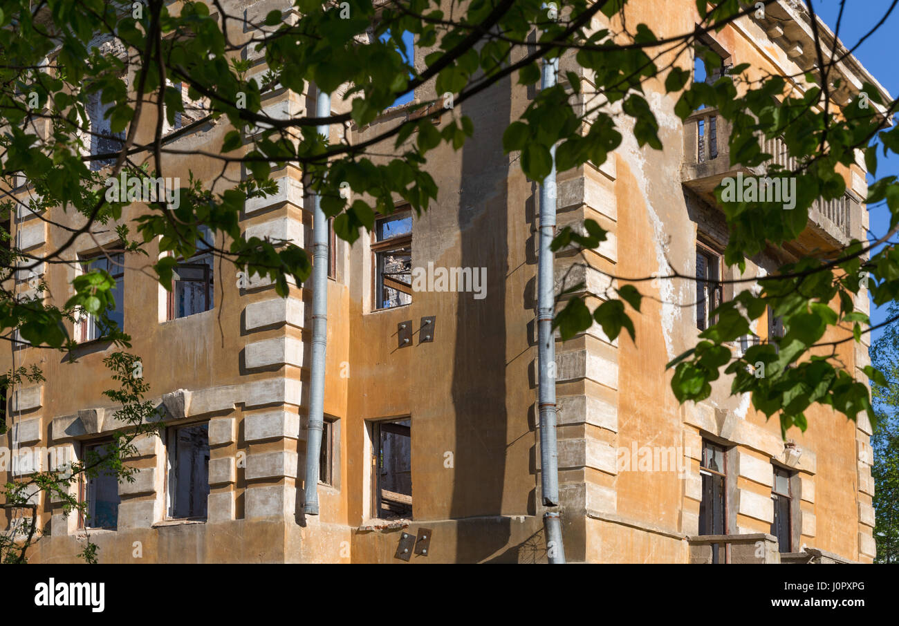 Abandoned building - broken tenement apartment house in daylight Stock ...
