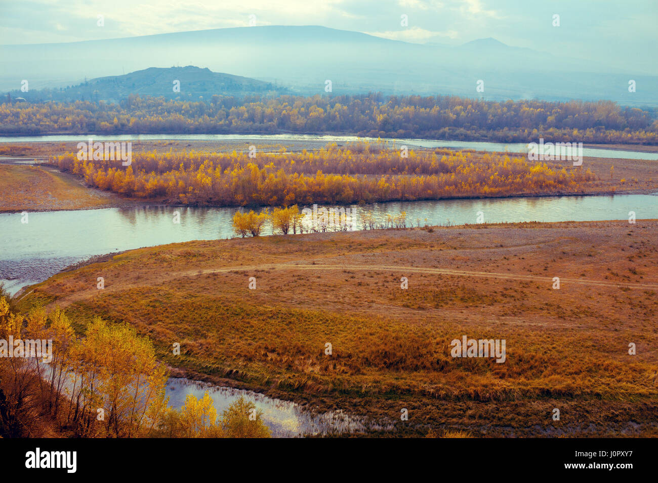 A winding river in the valley. Panoramic view from the mountain. Georgia, Europe Stock Photo