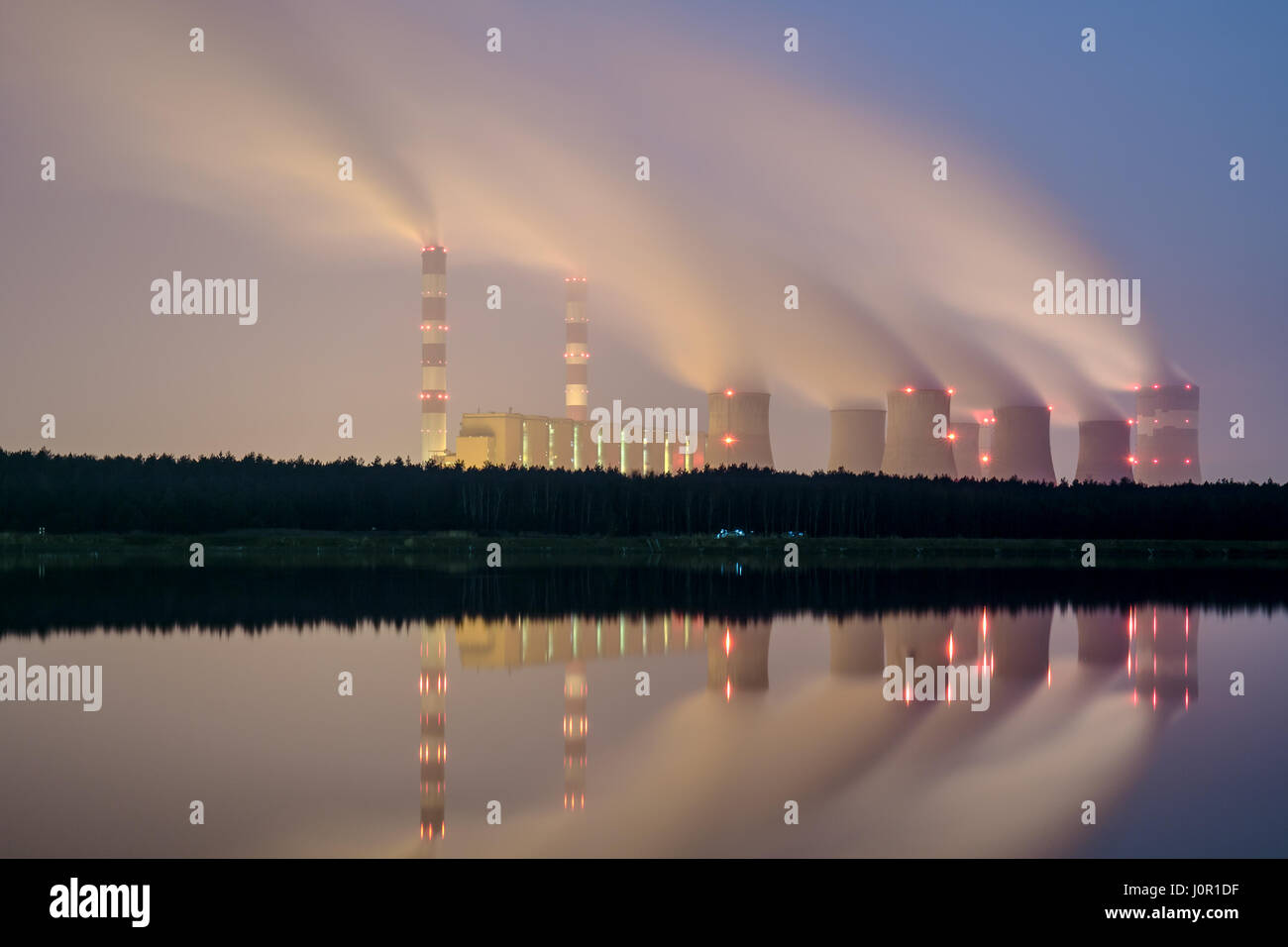 Smoke from the power plant chimneys at night. Long exposure Stock Photo ...