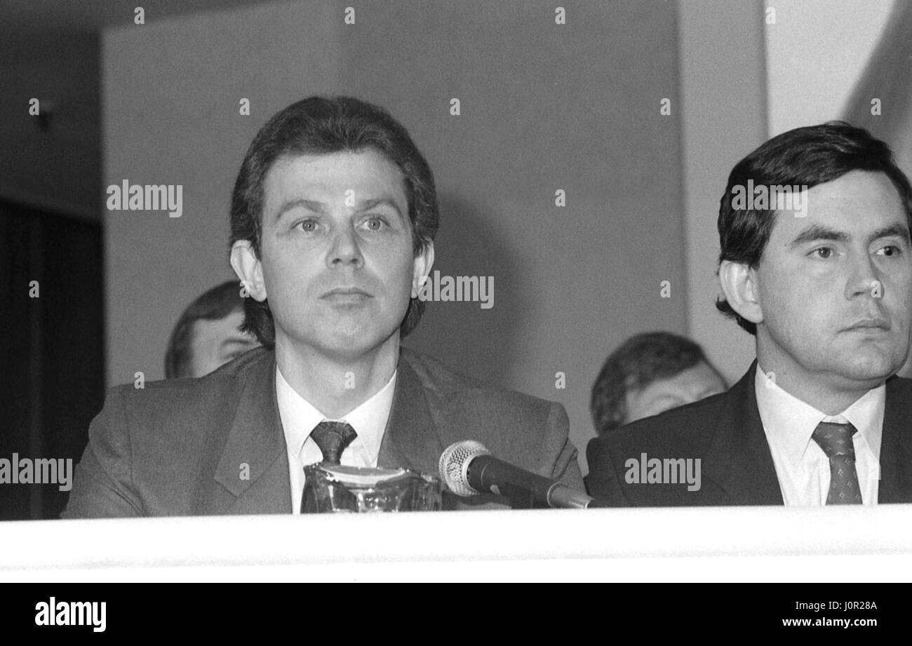 Tony Blair (left), Shadow Secretary of State for Employment and Gordon Brown, Shadow Secretary of State for Trade and Industry, attend a Labour party policy launch press conference in London, England on May 24, 1990. Both men later became party Leader and Prime Minister of Britain. Stock Photo