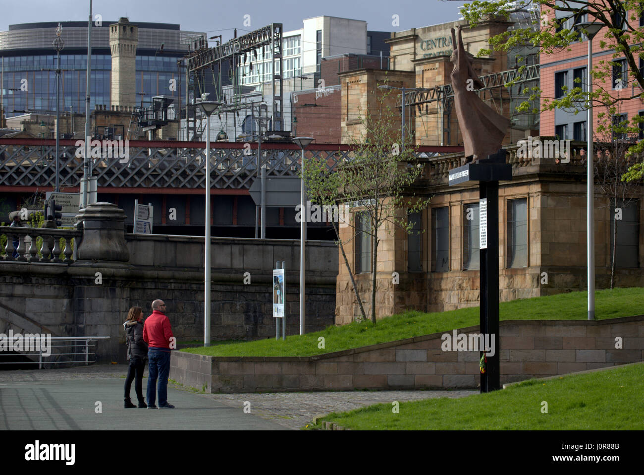 tourists gaze up at La Pasionaria Memorial Stock Photo