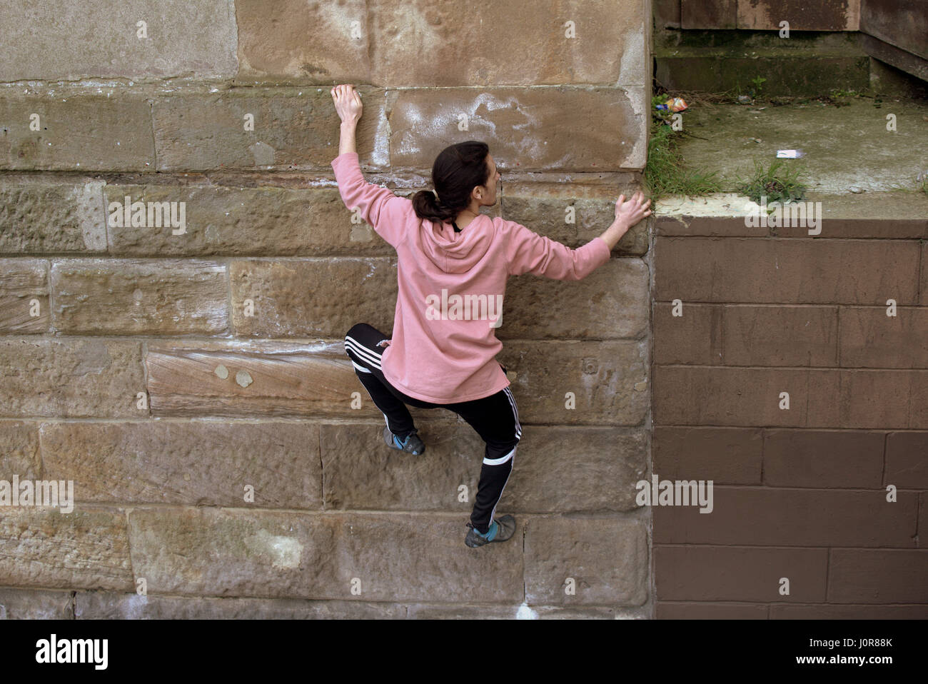 outdoors parkour climbing young people free style Stock Photo