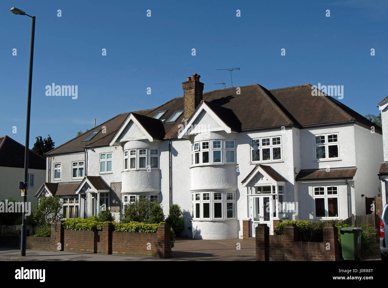 semi-detached houses with white pebbledash exteriors, in twickenham, middlesex, england Stock Photo
