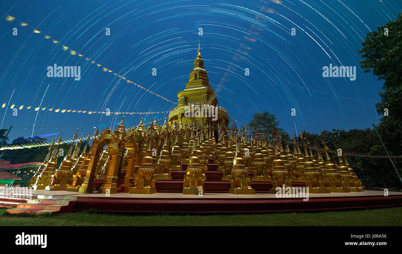 Star trails north polaris with blue sky at night at Wat Pa Sawang Bun, Saraburi, Thailand Stock Photo