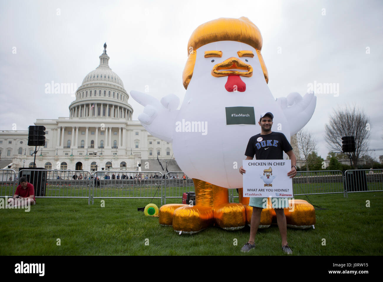 Washington, DC USA, Saturday, 15th April, 2017:  Thousands of protesters gather on Capitol Hill to demand president Donald Trump to release his taxes. Credit: B Christopher/Alamy Live News Stock Photo