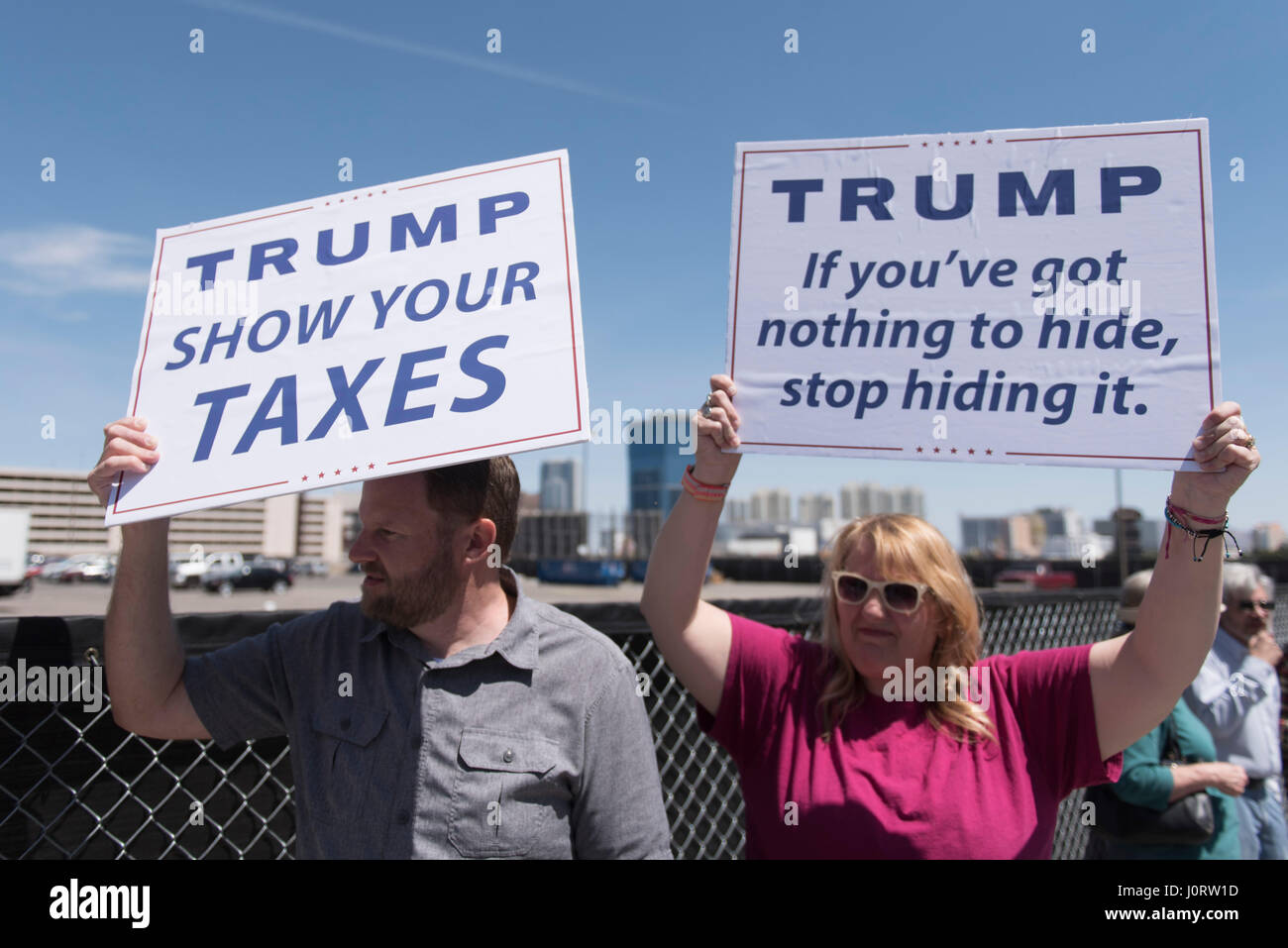 Washington, DC, USA. 15th Apr, 2017. Demonstrators outside of Trump International hotel demand President Trump releases his tax returns. Las Vegas, Nev., April 15, 2017. Tax Day rallies are held in dozens of cities across the country. Credit: Jason Ogulnik/Alamy Live News Stock Photo
