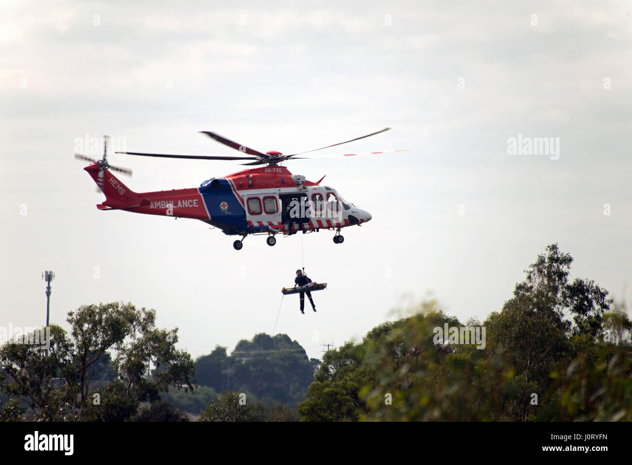Geelong, Australia. 16th Apr, 2017. An elderly man was hoisted to an air ambulance today at Buckley Falls, Highton, Geelong after falling down a rock face. Credit: mcnovies/Alamy Live News Stock Photo