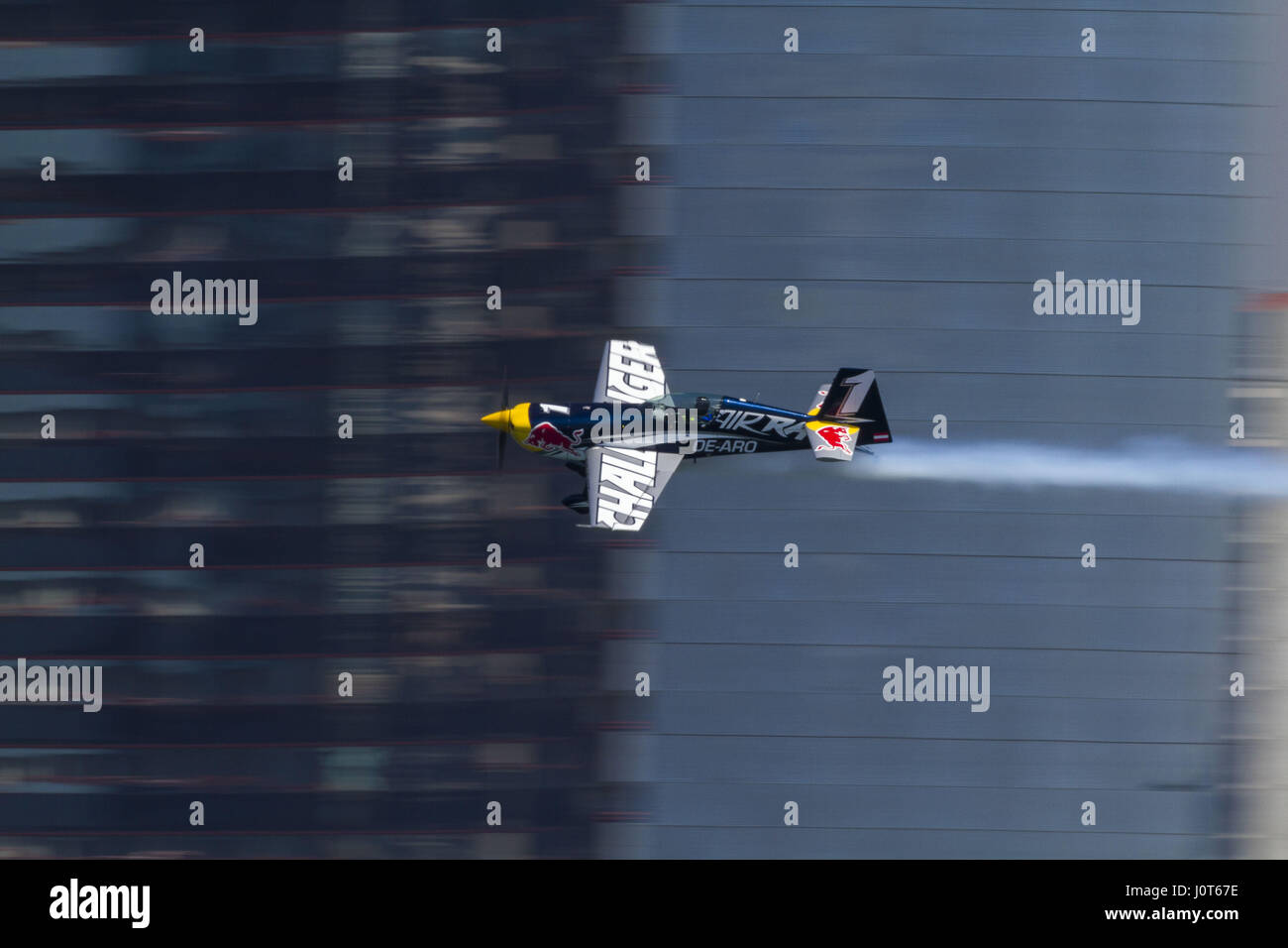 San Diego, USA. 15th Apr, 2017. On a beautiful sunny easter weekend, crowds line the beaches, rooftops, or anywhere they can to catch a glimpse of the planes screaming by.Challenger pilot Daniel Genevey of Hungary performs during the training at the second stage of the Red Bull Air Race World Championship in San Diego, United States on April 15, 2017 Credit: Daren Fentiman/ZUMA Wire/Alamy Live News Stock Photo