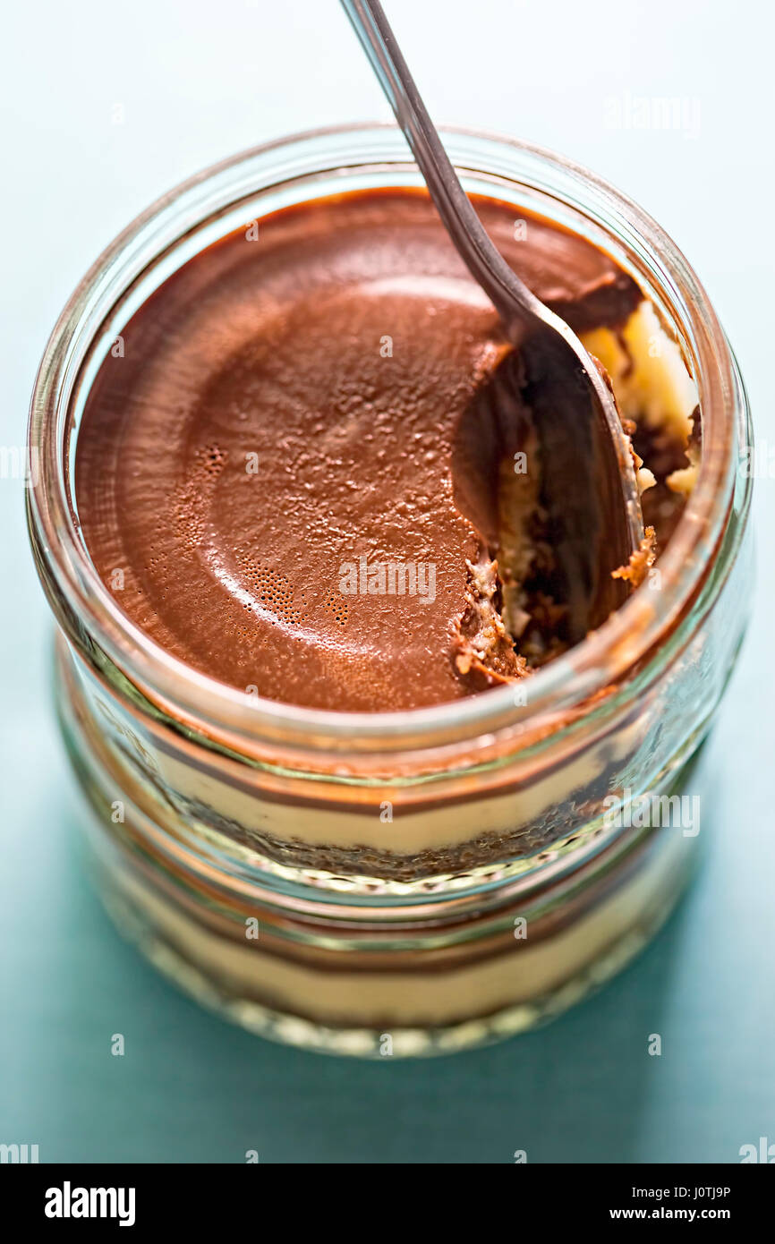 Two chocolate and vanilla cheesecake in the pot Stock Photo Alamy