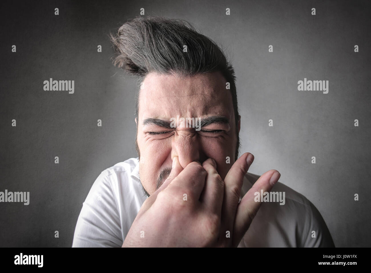 Funny Man Smelling Something Bad Stock Photo Alamy 33-ways-to-say-bad-in-english-english-study-here-learn-english