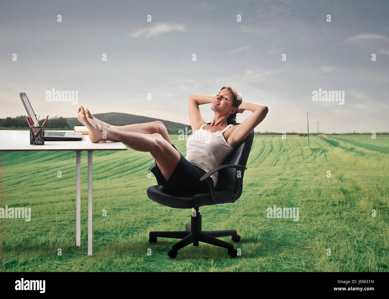 Woman relaxing in the nature Stock Photo - Alamy