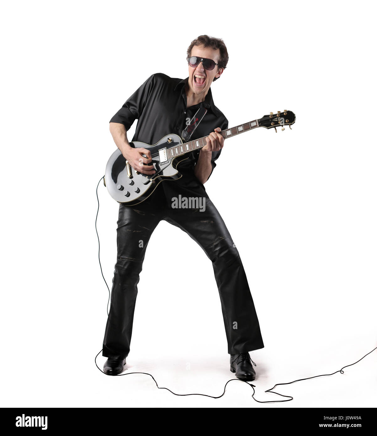 Singer man playing on guitar Stock Photo