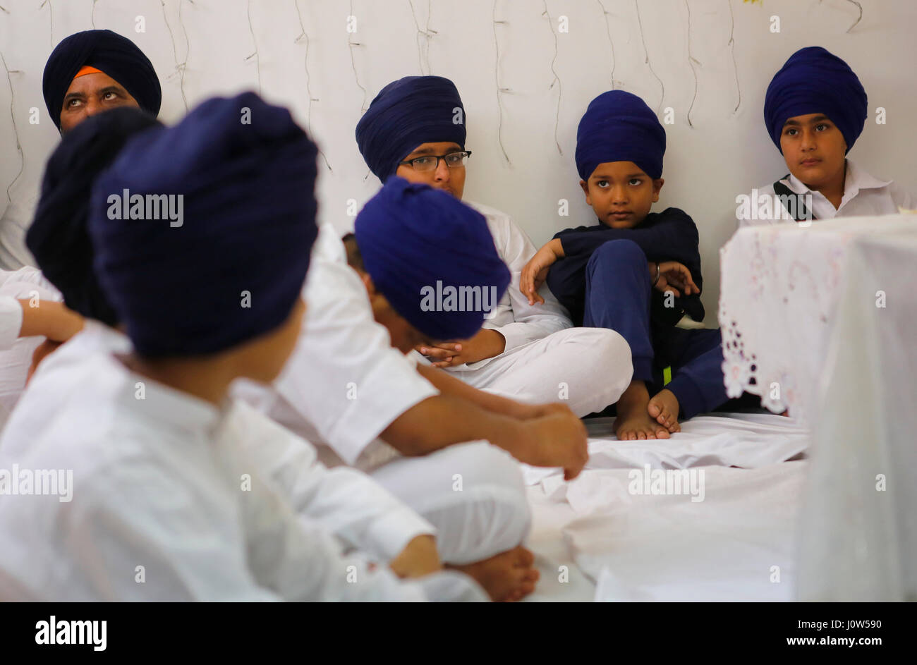 Sikh members seen during their Baisakhi celebration day inside a Sikh temple in the Spanish island of Majorca Stock Photo