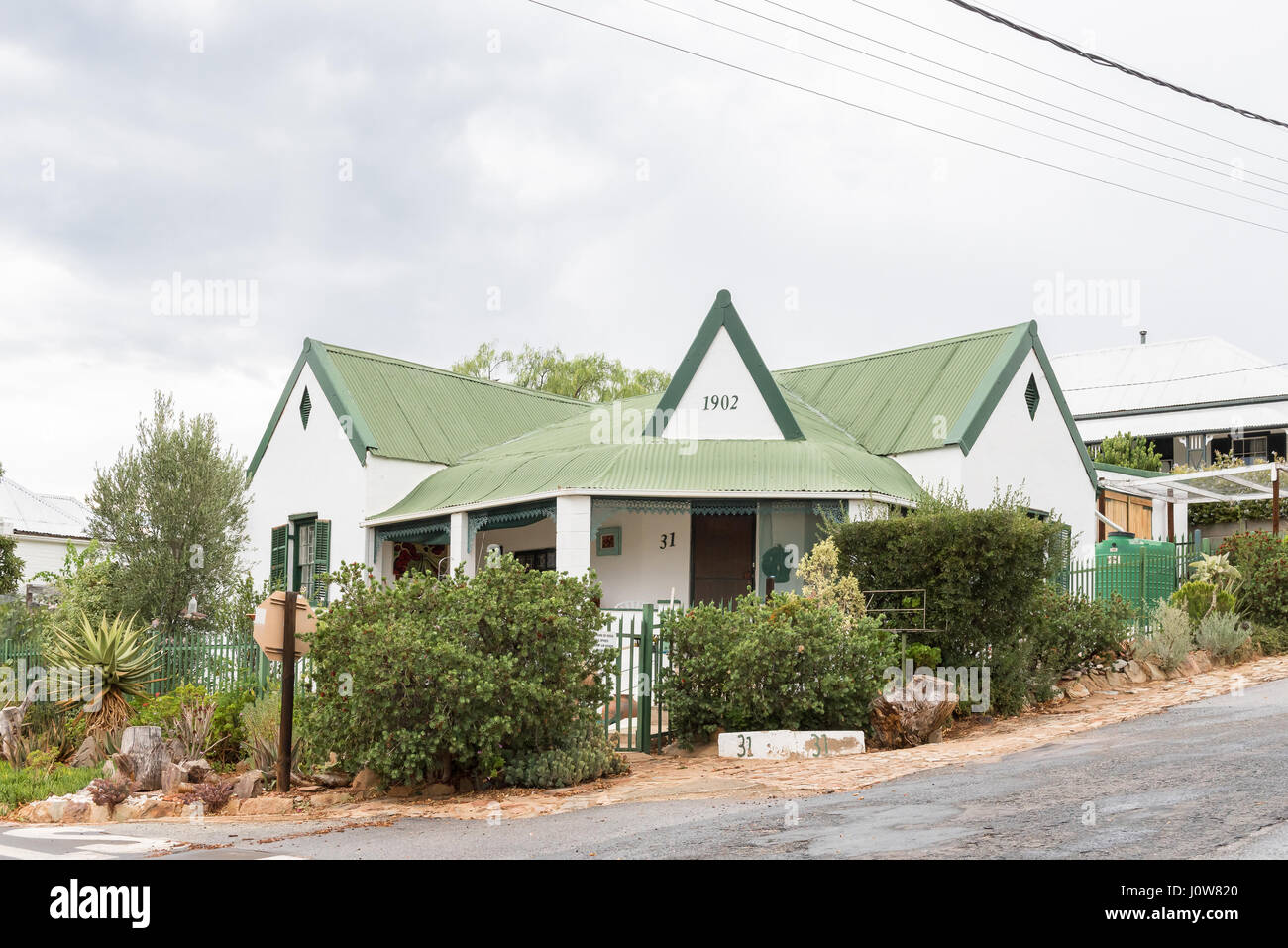 DE RUST, SOUTH AFRICA - MARCH 23, 2017: An historic old house, built 1902, in De Rust, a village in the Western Cape Province of South Africa Stock Photo