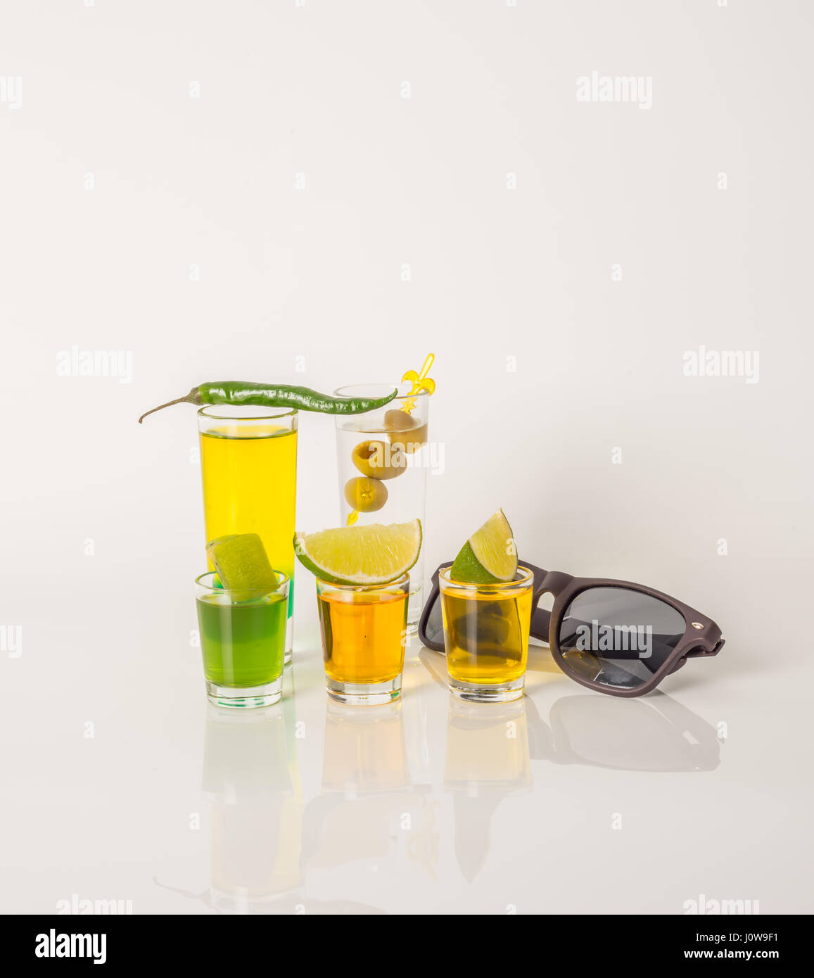 Colorful set of drinks, color drink decorated with fruit, color shots ...
