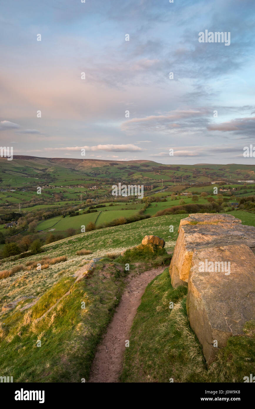View from the rocky summit of Eccles Pike in the Peak District, Derbyshire, England. A lovely spring evening with view towards Chinley. Stock Photo