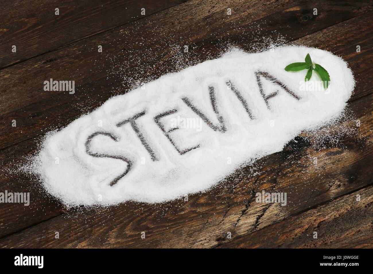 STEVIA written in stevia powder on wooden background Stock Photo