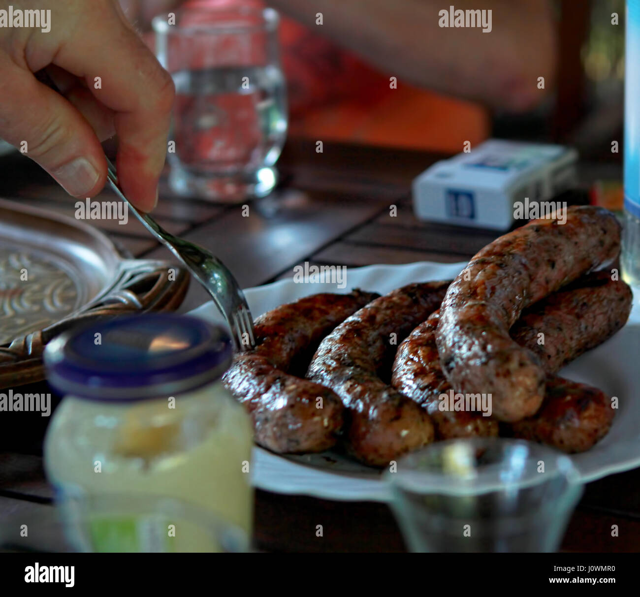 Grilled sausages on barbecue party Stock Photo Alamy