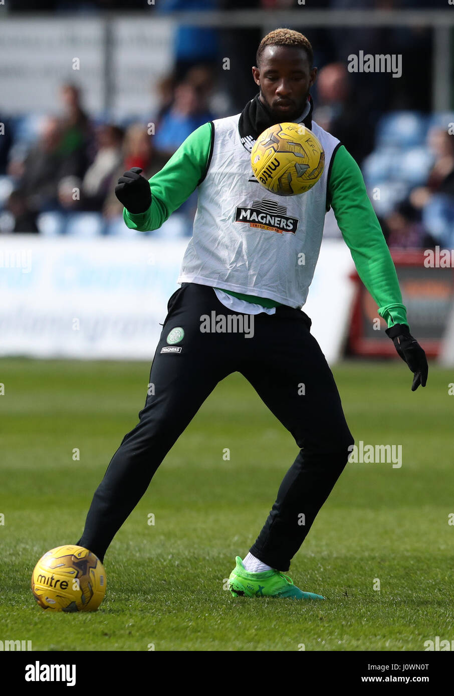 Celtic's Moussa Dembele warms up before the Ladbrokes Scottish Premiership match at the Global Energy Stadium, Dingwall. Stock Photo