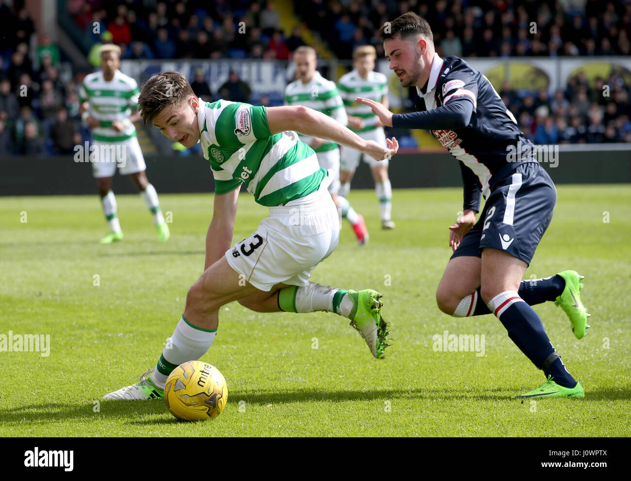Ross County's Reghan Tumilty and Celtic's Kieran Tierney battle for the ball during the Ladbrokes Scottish Premiership match at the Global Energy Stadium, Dingwall. Stock Photo