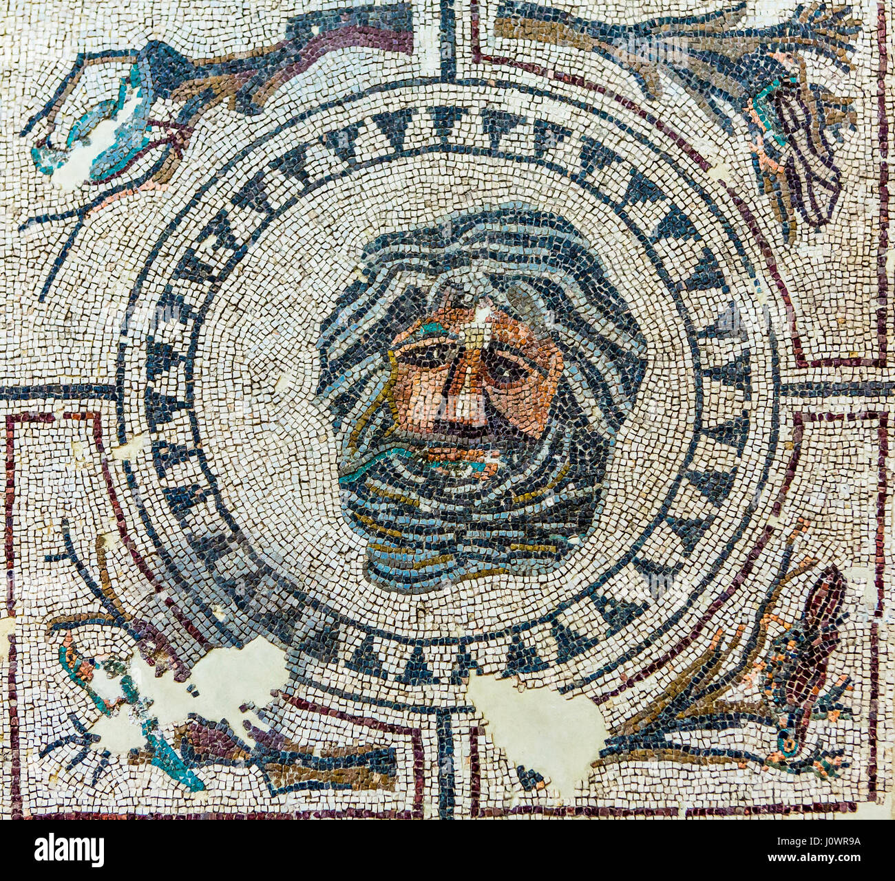 A Roman mosaic in the city museum of Ecija in Andalusia in southern Spain. Ecija was founded in the eight century B.C. Stock Photo