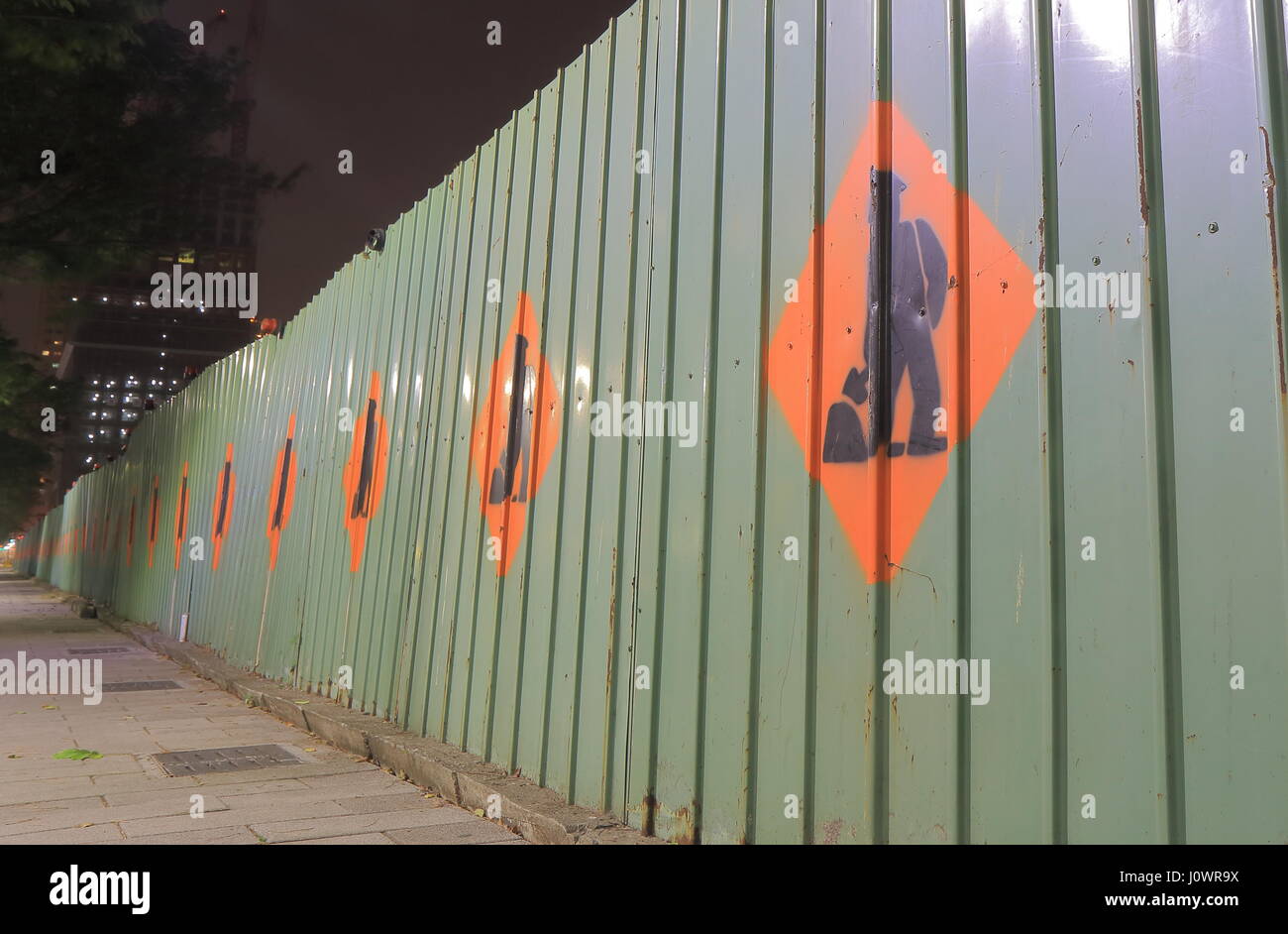 Construction site fence Stock Photo - Alamy