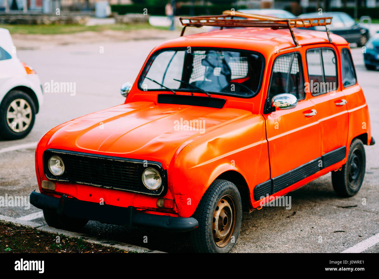 Red retro car in Montenegro, marks of Zastava, production of Yugoslavia. Stock Photo