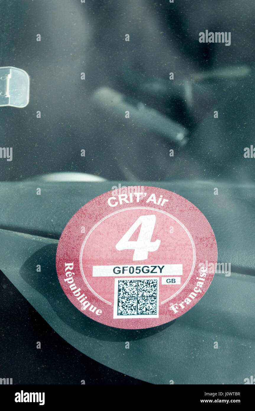 Crit’Air anti-pollution stickers have to be displayed on cars driving on continental Europe in the French cities of Paris, Grenoble and Lyon. Stock Photo